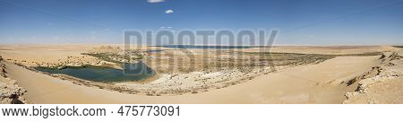Panoramic Aerial View Over Remote African Egyptian Desert Landscape Valley With Oasis Salt Lake And 