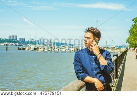 Businessman Traveling In New York. Wearing Blue Collarless Shirt, Pants, A Young Guy Standing By Bus