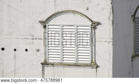Fake Window Of White Terraced Residential Buildings With Where The Upper Floor Is Used As A Place Fo