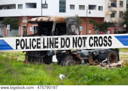 Truck Burnt By A Pyromaniac With A Police Tape With Written In It 