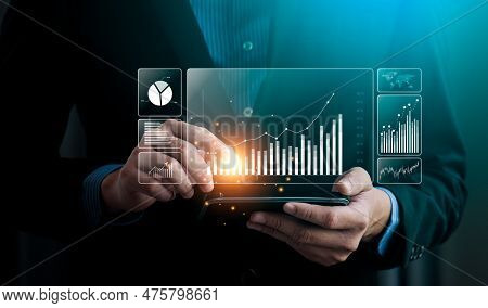 Businessman Analyzing Business Enterprise Data Management, Business Analytics With Charts, Metrics A