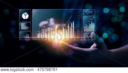 Businessman Analyzing Business Enterprise Data Management, Business Analytics With Charts, Metrics A
