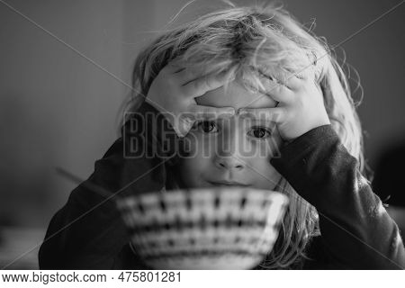 Child Have A Breakfast. Sad Boy Eating Healthy Chicken Noodle Soup For Lunch. Unhappy Baby Child Tak