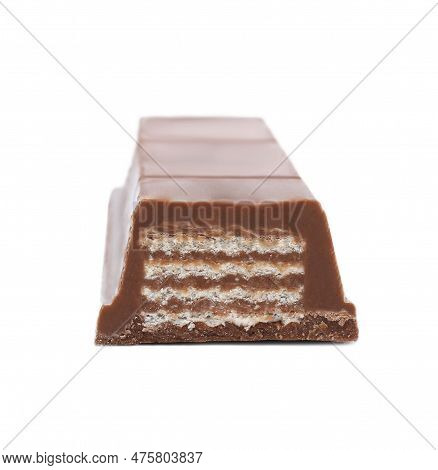 Piece Of Sweet Tasty Chocolate Bar On White Background