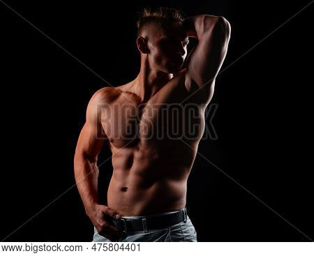 Mans Powerful Shoulders. Chest Muscles. Muscular Shirtless Manked Man Model Showing Strong Shoulders