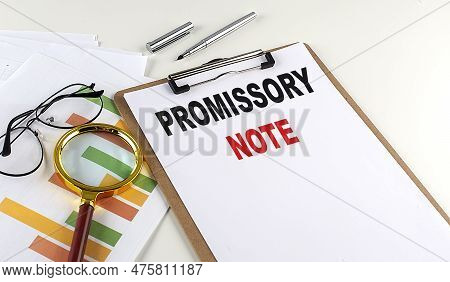 Promissory Note Text On A Clipboard On White Background, Business Concept