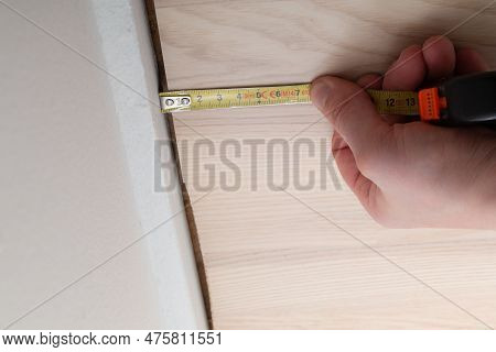 Measure Floor Length With Ruler - Laying Laminate Click Floor