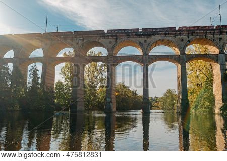 Railway Bridge With River In Bietigheim-bissingen, Germany. Autumn. Railway Viaduct Over The Enz Riv