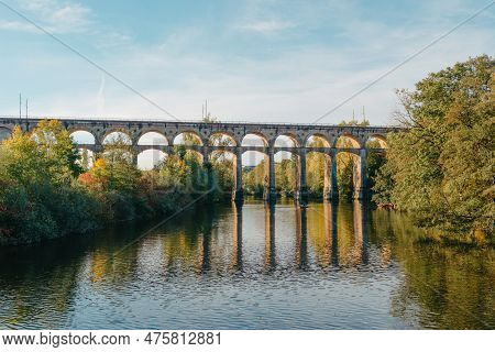 Railway Bridge With River In Bietigheim-bissingen, Germany. Autumn. Railway Viaduct Over The Enz Riv