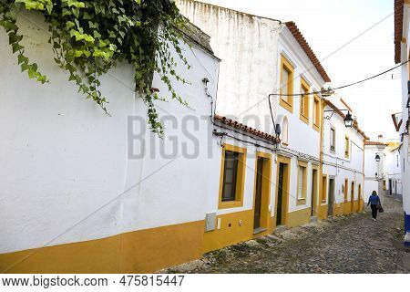 Evora, Portugal- October 10, 2022:typical Portuguese Facades And Cobblestone Streets In Evora Town, 