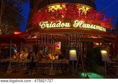 Paris, Franceapril 29, 2023 : The Triadou Haussmann Restaurant, Traditional Parisian Brasserieat Nig