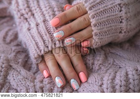 Women's Hands With A Beautiful Manicure In A Warm Pink Knitted Sweater. Winter Trend, Cover Pink Nai