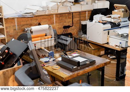 Modern Paper Trimmer And Professional Print Plotter Machine In Print Center.