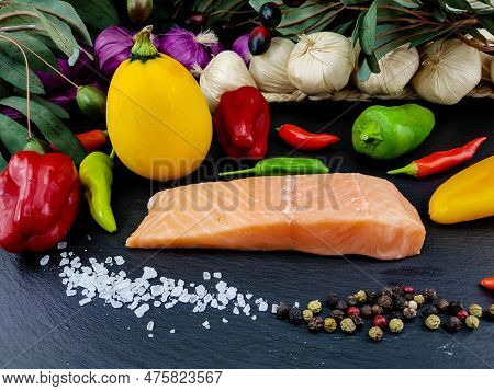 Italian Pappadelle Pasta With A Roasted Salmon Steak And Vegetables