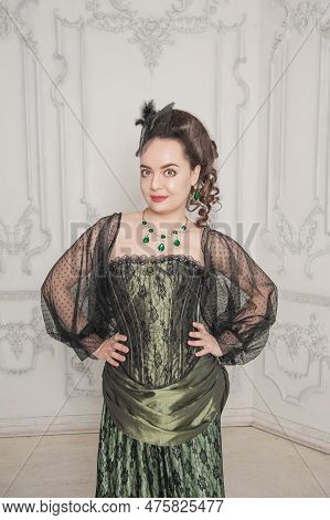 Beautiful Young Smiling Woman Wearing Green Medieval Vintage Victorian Style Dress