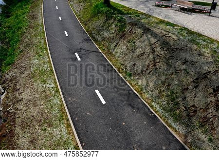 Stabilization Of Slopes By Hydro Sowing. A Mixture Of Wood Pulp And Green Grass Seed Is Sprayed From