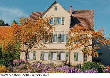 House With Nice Garden In Fall. Flowers In The City Park Of Bietigheim-bissingen, Baden-wuerttemberg