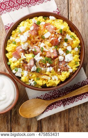 Banush Or Banosh Is A Ukrainian Dish Prepared From Cornmeal With Cream Topped With Bacon, Onion And 