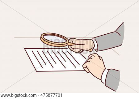 Lawyer Hands With Magnifying Glass Over Contract For Concept Of Checking Documents For Errors Or Exa