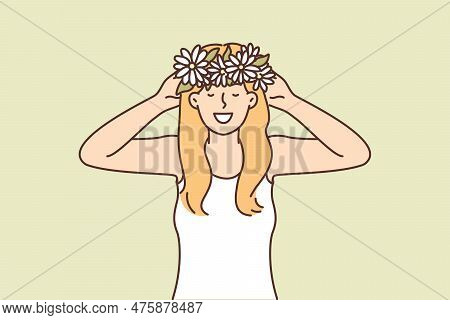 Woman Puts On Head Wreath Of Spring Flowers Collected In Meadow And Rejoices At Onset Of Warm Weathe