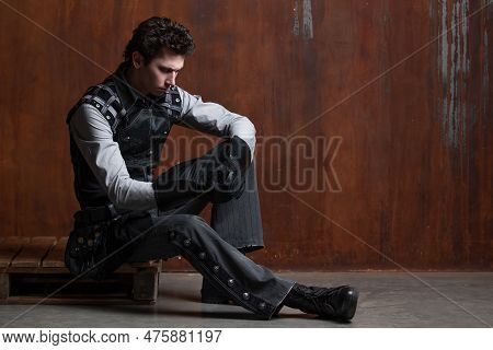 A Young Man In A Victorian-style Suit, A Retro Character. Antihero Or Tragic Character