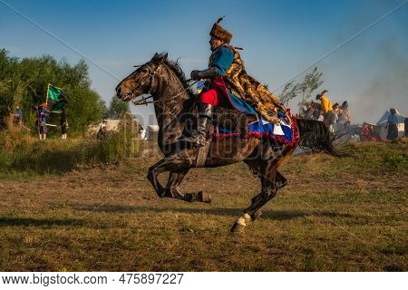 Gniew, Poland, Aug 2020 Closeup On Polish Cavalry, Hussar, Riding A Horse On Battlefield, Historical