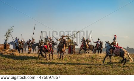 Gniew, Poland, Aug 2020 Polish Heavy Cavalry, Hussars Sword Fighting On A Battlefield. Historical Re