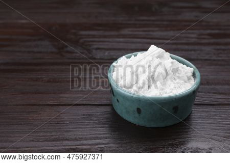 Starch In Bowl On Wooden Table, Closeup. Space For Text