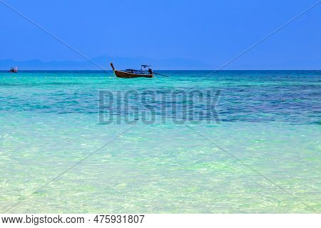 Old Traditional Thai Motorboat Made Of Wood For Fishing And Transporting Tourists On Excursions In T