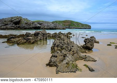 View On Playa De Borizo In Celorio, Green Coast Of Asturias, North Spain With Sandy Beaches, Cliffs,