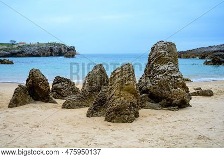 View On Playa De Toro In Llanes, Green Coast Of Asturias, North Spain With Sandy Beaches, Cliffs, Hi