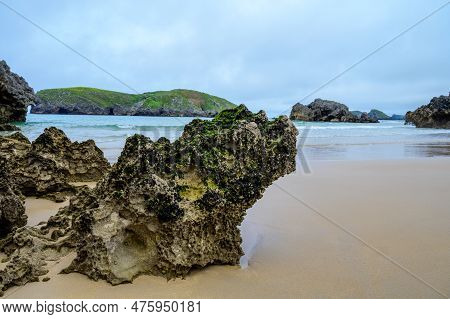View On Playa De Borizo In Celorio, Green Coast Of Asturias, North Spain With Sandy Beaches, Cliffs,