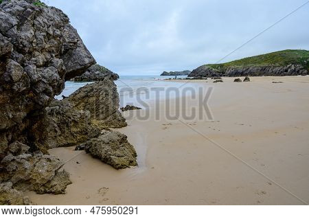 View On Playa De Borizo In Celorio, Green Coast Of Asturias, North Spain With Sandy Beaches, Cliffs,