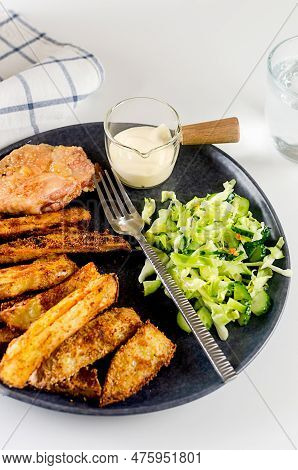 Fried Chiken Meat With Baked Potatoes In Spices And Salad On Plate For Tasty Lunch. Baked Chiken Wit