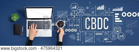 Cbdc - Central Bank Digital Currency Concept With Person Using A Laptop Computer