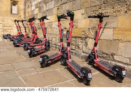 Oxford, Uk - June 11, 2022: Shared Electric Scooters For Rent By The Voi Company In A Street In Oxfo