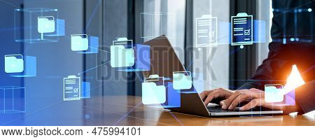 Businessman Hands Typing In Laptop, Double Exposure With Digital Documents Icons, Cloud Storage And 