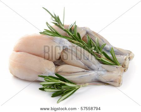 Two Pairs Of Fresh Frog Legs On White Background