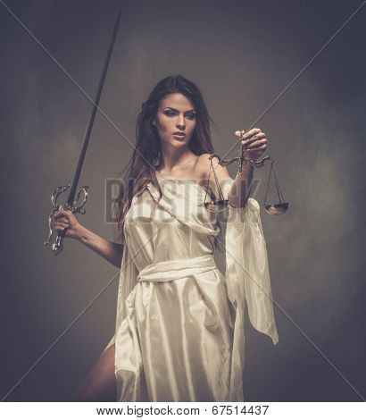 Femida, Goddess of Justice, with scales and sword 