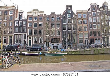 Water canal and typical architecture in city Amsterdam