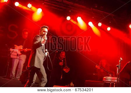 LOULE - JUNE 26: Ala dos Namorados, traditional band from Portugal, performs on stage at festival med, a world music festival, in Loule, Portugal, June 26, 2014 