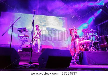 LOULE - JUNE 26: Bomba Estereo an eletronic dance music band from Colombia, performs on stage at festival med, a world music festival, in Loule, Portugal, June 26, 2014  