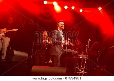 LOULE - JUNE 26: Ala dos Namorados, traditional band from Portugal, performs on stage at festival med, a world music festival, in Loule, Portugal, June 26, 2014 
