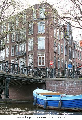 Water Canal And Typical Architecture In Amsterdam, Netherlands