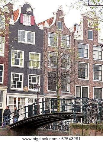 Water Canal And Typical Architecture In Amsterdam, Netherlands