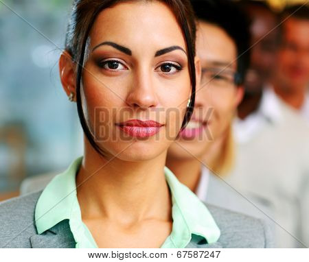 Group of business people in the office lined up
