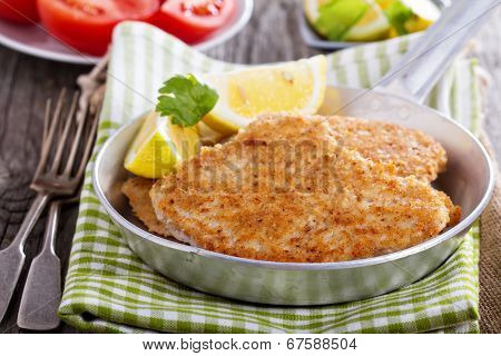Pork schnitzel with parmesan