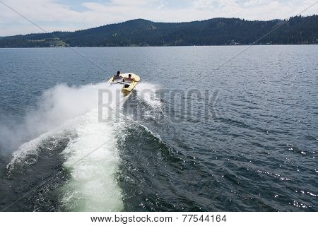 Speedboat Heading Out Into The Lake