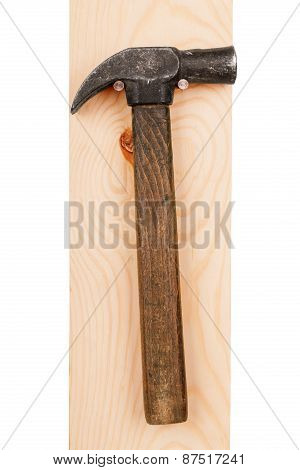 Hammer On A Wooden Board