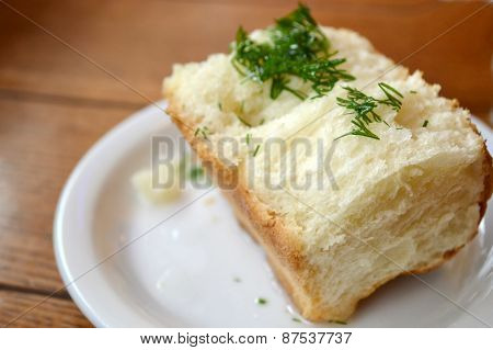 Traditional bread pampushki with parsley and garlic